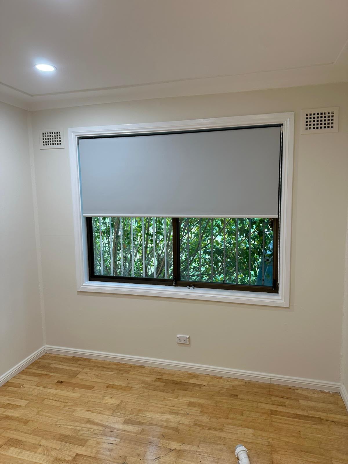 Sleek cassette roller blinds custom fitted perfectly to window frames
